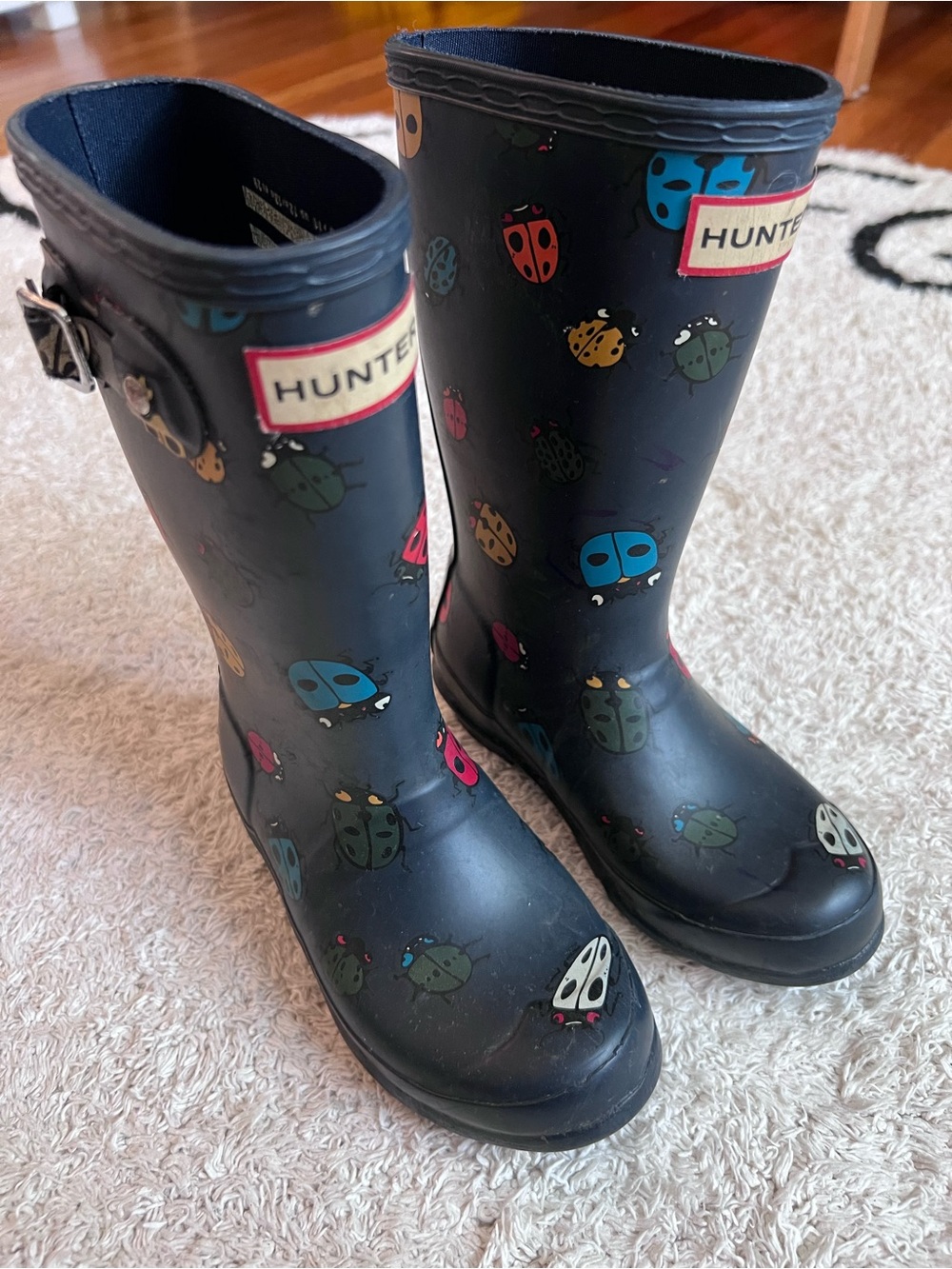 Hunter Kids Navy Rain Boots with Multicolor Ladybug Print